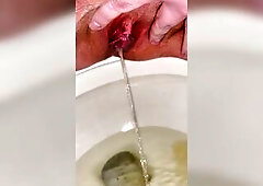 Bald indecent twat has longest continuous void urine in crapper