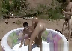 Naked boys wrestling on the beach 3