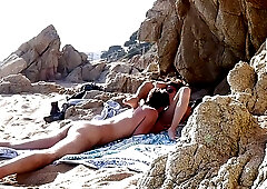 Horny amateur couple was caught fucking on the beach, the other day, but they didn't care