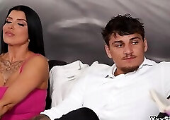 Not only that, but she's sitting right next to him on the couch