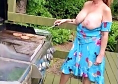 Real Topless Mommy Enjoying The Summer Barbecuing With Her Mature Milf Big Tits Out In The Sunshine