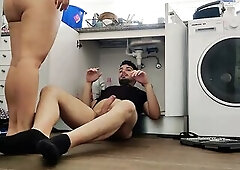 Concupiscent wife screws handyman below the sink.