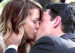 Ravishing Jessica Drake gives head to her man in the car