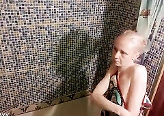 A short dude licks and bangs a much taller, slim, aged amateur in the washroom