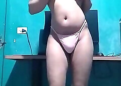 slender, feminine femboy in pink lingerie
