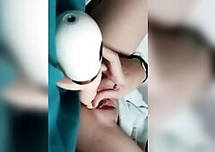 This angel plays with her sextoy