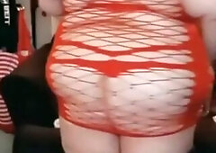 Flirty big beautiful woman red suit show off
