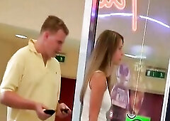 Great looking golden-haired teen in a short jeans petticoat flashes her booty and vagina in a mall on this amateur voyeur vid