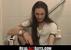Long-haired stud strokes his cock intensely while relaxing in the bathtub