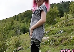 hotty with pink tips walks in nature in the mountains attracting attention to herself