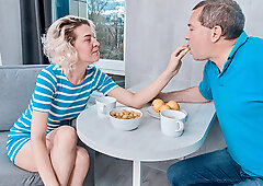 Playful babe rides an experienced dick for breakfast