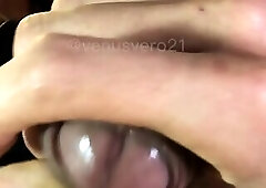 Stroking her big cock with her black nails and shooting a cumshot