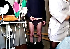 Curvy nurse treats patient with her hands