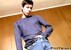 young fellow pees and pours it on himself before masturbating