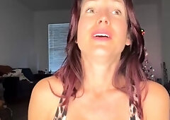Amateur redhead Jacqueline with glasses masturbates