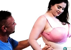 A dude is watching TV when his babefriend comes over. This babe doesn't wanna play. That babe craves to model bras for him and needs aid trying &