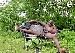 Tormentor Sir Maxximus strokes his massive black cock in the woods