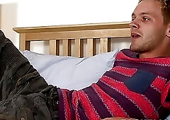 Cute twink plays with his dick after taking clothes off