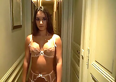 Tiffany Leiddi teases in pink lingerie and delivers a deep throat blowjob on the wooden floor