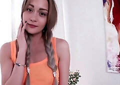 Olivia Devine and a young blonde teen explore anal pleasure in a sunlit room