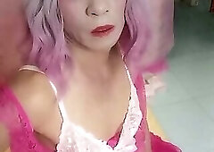 Transgender Oanh Le wears a sexy dress and masturbates.