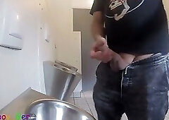 Im pissing into the urinal of a public restroom and jerking off my thick cock until Im precumming.