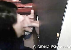 Tgirl sucking rod at gloryhole