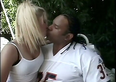 Blonde beauty and dark-haired athlete share vintage backyard intimacy with deep anal connection