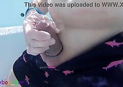 Wanking off my ample manmeat in a public outdoor whirlpool, with a bone ring on, in a close up shot.