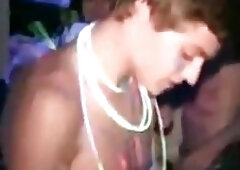 College Boys Covered In Glow Stick Paint At Dorm Room Party