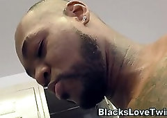 Gay twink blows big black cock