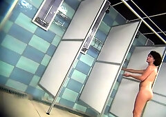 Hidden camera in public shower captures naked women