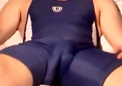 jerk off in blue wrestling gear