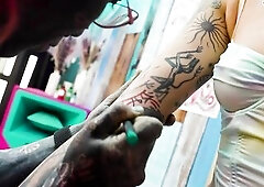 Edone comes to Lily Lu for a fresh bit of ink. In this studio things go different and Lily provides distraction with his hard fully tattooed wang. let