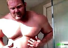 Muscular gay hunks showing off their figures