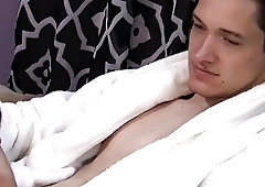 Bearded stud and handsome jock masturbate next to each other