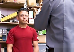 Loss Prevention officer kept an eye on the latino male