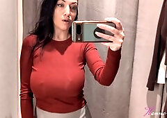 Curvy babe Hanna Orio flaunts her big natural boobs in a public fitting room