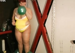 I blow a lot of green balloons and have joy with the balloons. Whilst wearing a constricted yellow swimsuit :) and later merely heels. Sexy episode fo