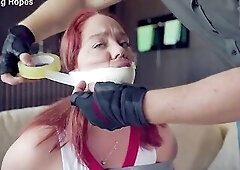 Cute Youthful red head bound and gagged by her intruder as cheer leader EP