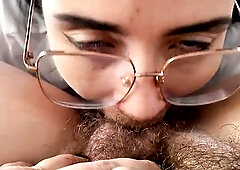 Lesbo sucking a lovely hirsute bush