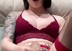 Gorgeous babe in red lace lingerie jerking her hard cock