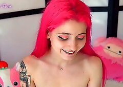 Small tits tattooed teen with pink hair Emma Fiore does a webcam show