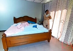 Nudist housekeeper Regina Noir makes the bedding in the bedroom. In nature's garb maid. Undressed housewife. c2