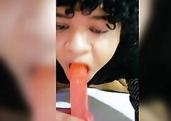 Large Booty Femboy gives a Oral pleasure to a Sex-toy