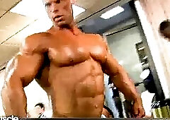 Tommy Wooster Lifting Weights And Flexing and Posing Backstage