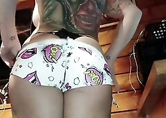 Nasty hotty stuffs her shorts into her little butt with her pants on and goes to educate.