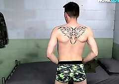 Assfingering amateur jock strokes his dick in solo action