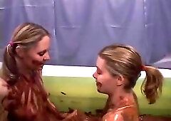 Nina & her gf Kira play in pudding