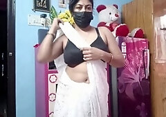 Horny Indian aunty Pallavii Sharma in a sexy saree plays with her furry coochie and jiggly big tits
